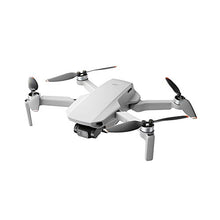Load image into Gallery viewer, DJI Mini 2 Fly More Combo – Ultralight Foldable Drone, 3-Axis Gimbal with 4K Camera, 12MP Photos, 31 Mins Flight Time, OcuSync 2.0 10km HD Video Transmission, QuickShots, Gray
