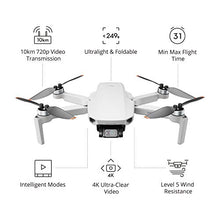 Load image into Gallery viewer, DJI Mini 2 Fly More Combo – Ultralight Foldable Drone, 3-Axis Gimbal with 4K Camera, 12MP Photos, 31 Mins Flight Time, OcuSync 2.0 10km HD Video Transmission, QuickShots, Gray
